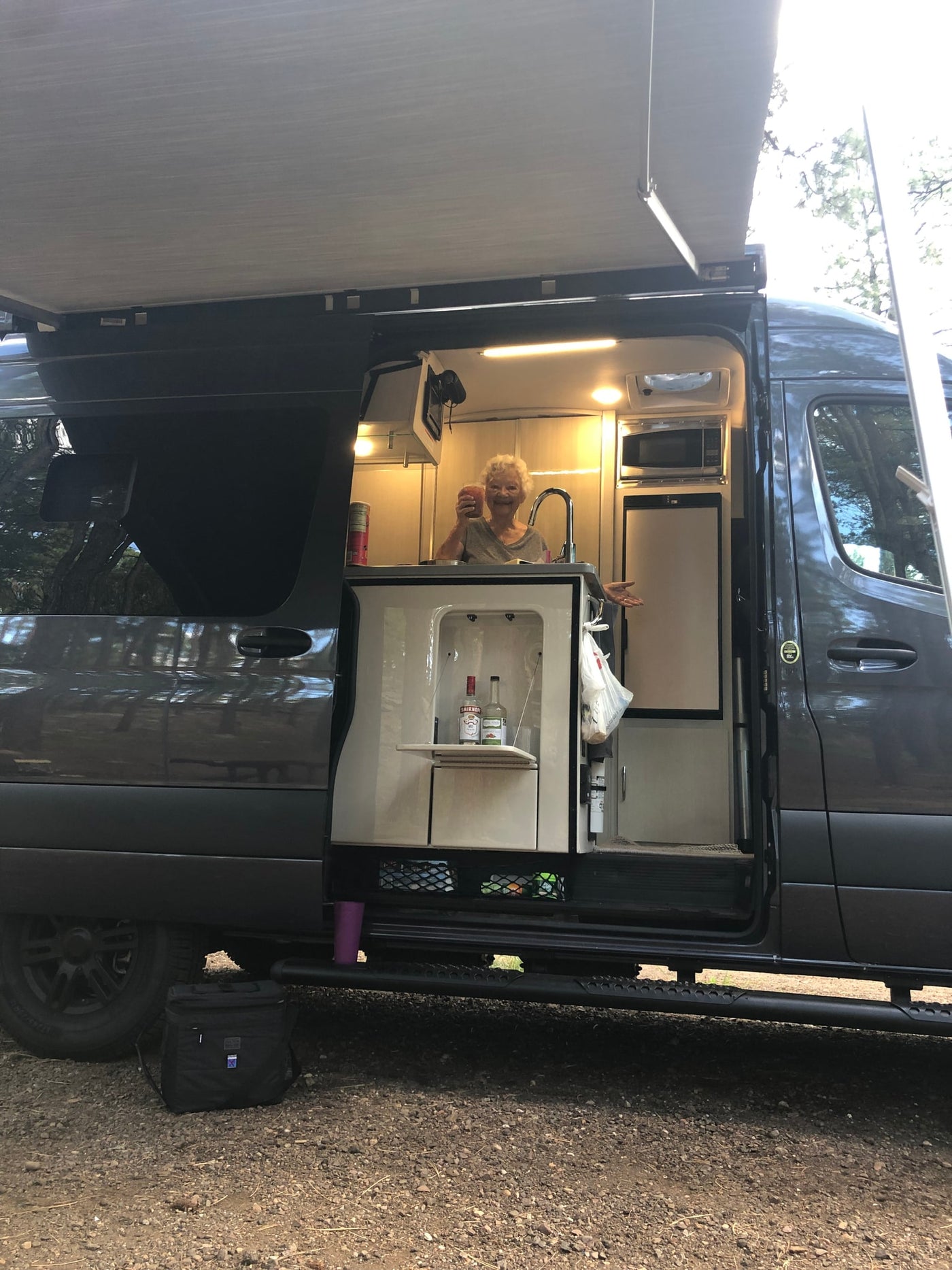  perfect for mobile cooking.|Happy woman in her spacious RV rental's mobile kitchen — photo 4