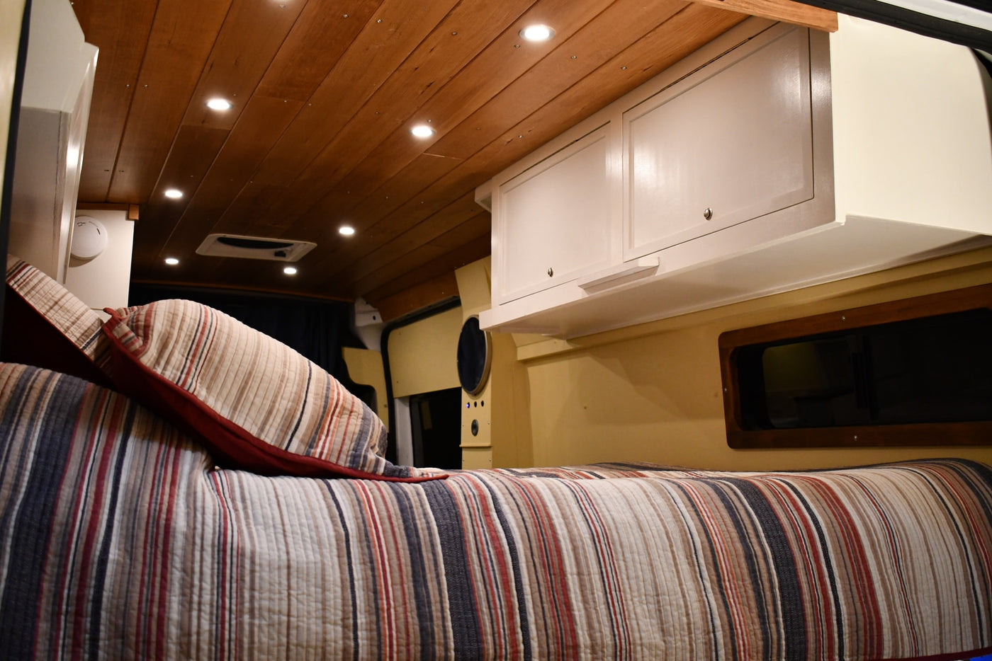  ready for camping & exploration.|Rear view of a white Ram ProMaster camper van — photo 11