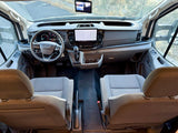 Experience a modern RV rental from the driver's perspective: Ford cockpit with large screen, navigation, and camera views.