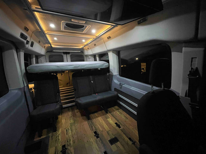 and attractive wood floor.|Customized RV rental interior with wood floor