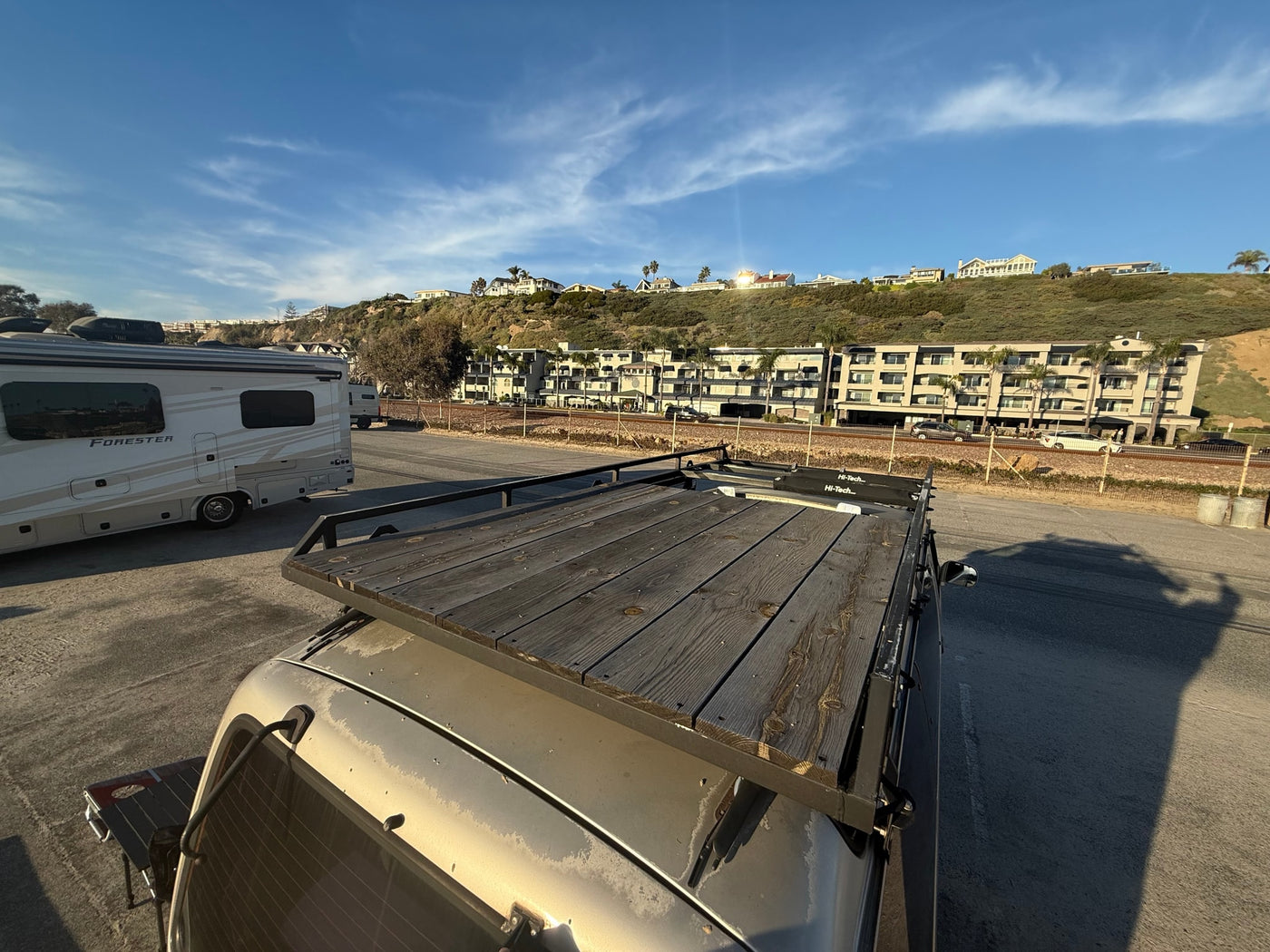  and stunning ocean views for your travel adventures.|Relax in this cozy rv rental campervan! Enjoy a comfortable bed with stunning beach and ocean views — photo 6