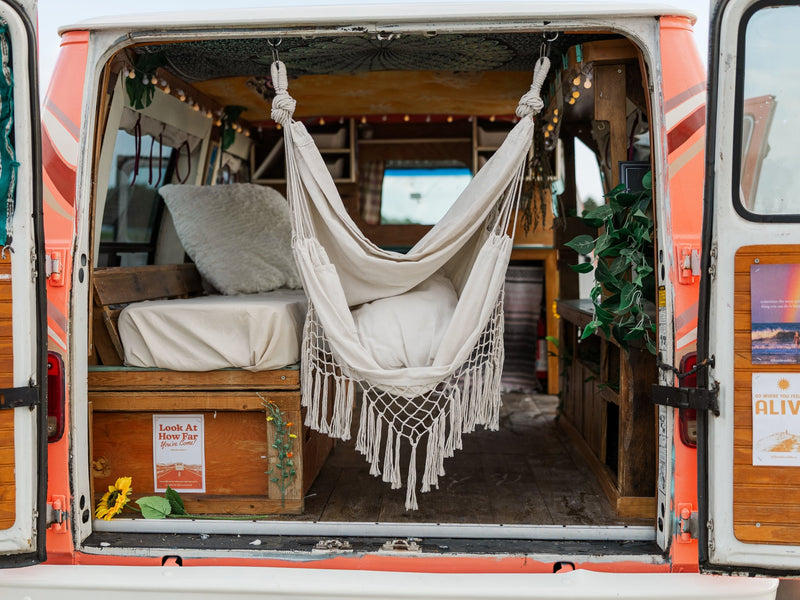  perfect for an RV rental adventure.|Inside this cozy RV rental: a wooden bench with teal top — photo 13