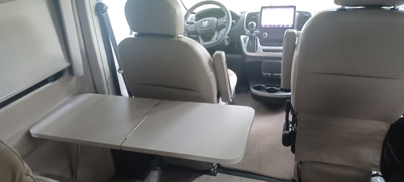  equipped with a Thule awning and Truma system.|RV rental van interior with a versatile bed/seating — photo 10