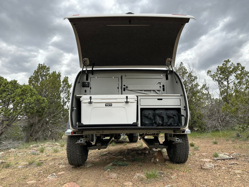  parked off-road for adventure camping under cloudy skies.|Inside this RV rental — photo 2