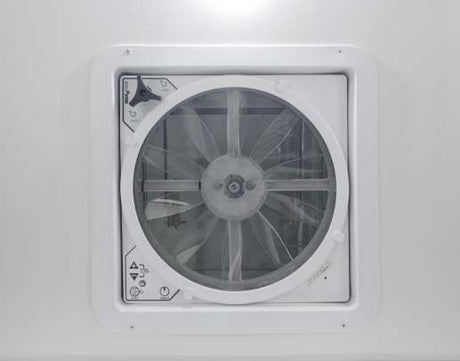 White ceiling fan in an RV rental, providing essential ventilation for a comfortable journey.