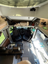  and an overhead bunk. Ideal for road trips.|This customized blue/grey camper van