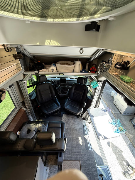  and an overhead bunk. Ideal for road trips.|This customized blue/grey camper van