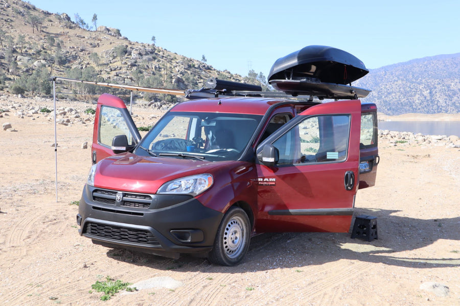  ready for desert road trips.|An **rv rental** red Ram ProMaster City van