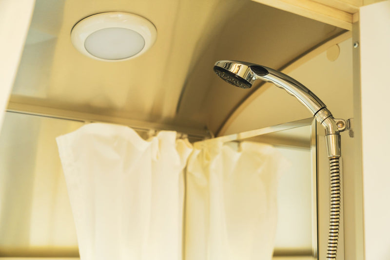  empty refrigerator inside an RV rental — photo 8