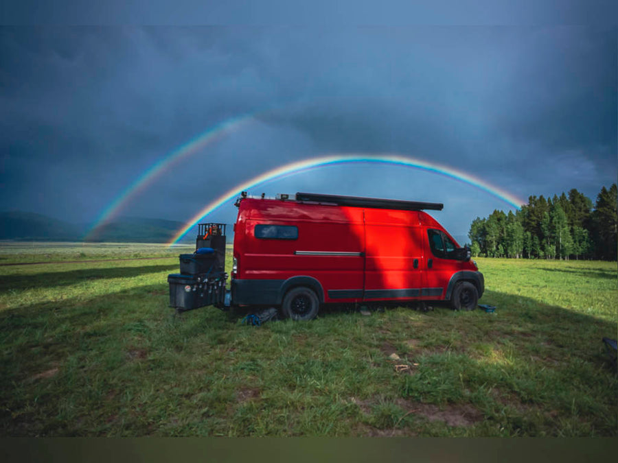 and unique wood-and-resin counter.|RV rental's cozy mobile kitchen: wood & resin countertop