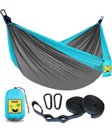 Portable grey & blue hammock set with straps and carabiners, perfect for your next RV rental outdoor adventure.