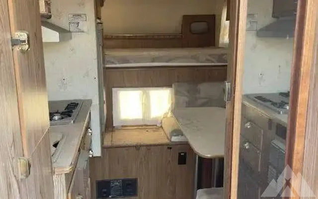 Cab over camper on flat bed trailer — photo 2