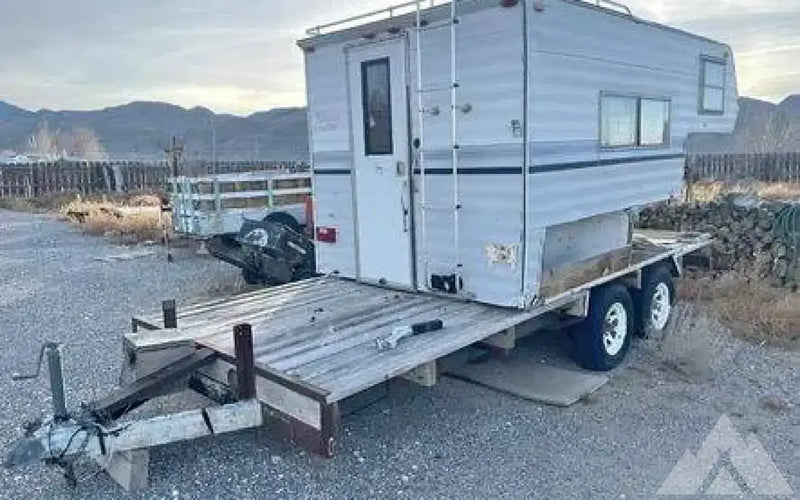 Cab over camper on flat bed trailer — used for sale in Gabbs, NV — photo 1