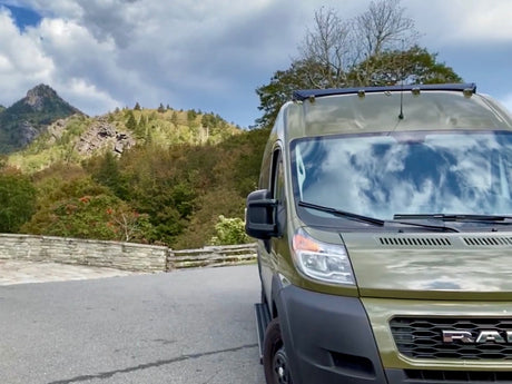  and nature view outside.|Cozy RV rental interior featuring a comfy bed
