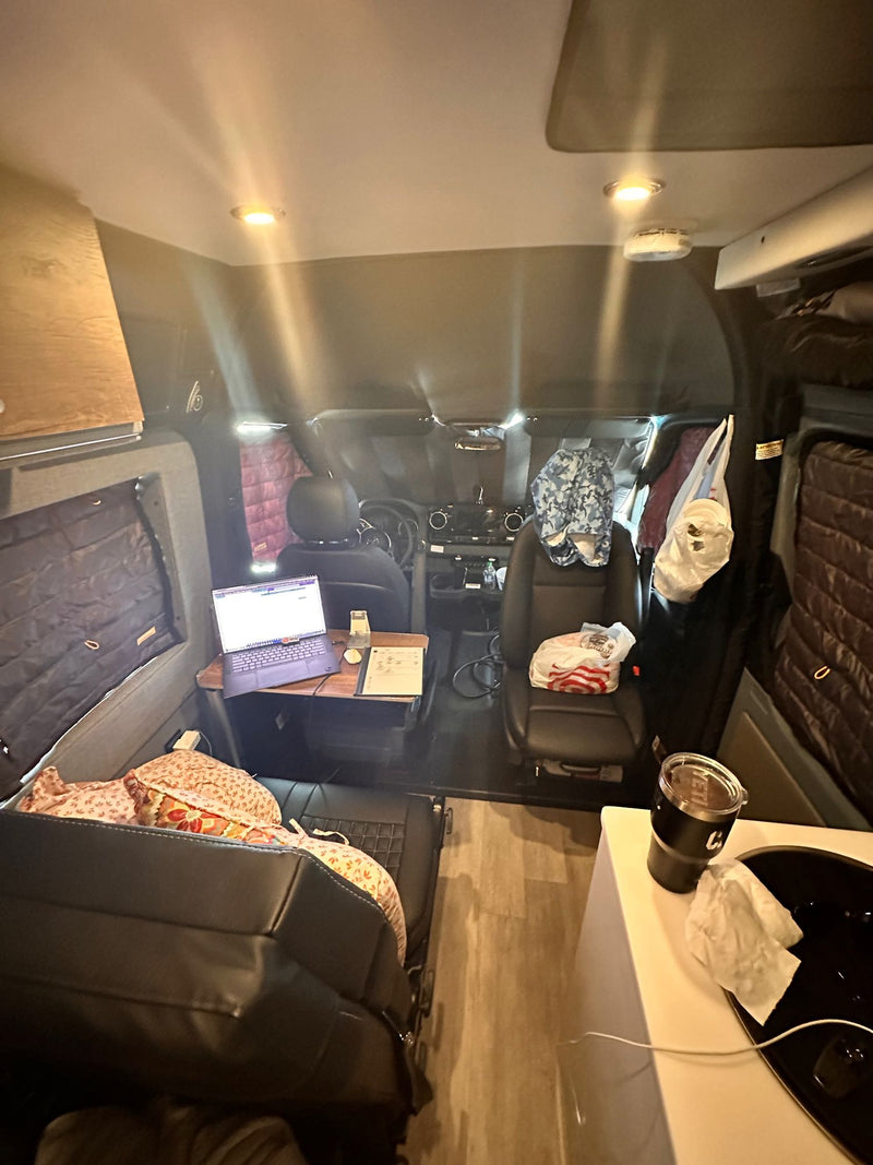  with a bridge and passing cyclists.|A gray Mercedes Sprinter van — photo 8