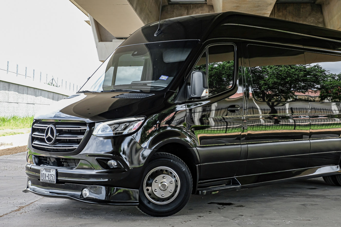 Sleek black Mercedes-Benz Sprinter van, ideal for luxury RV rental & group transport. — photo 3