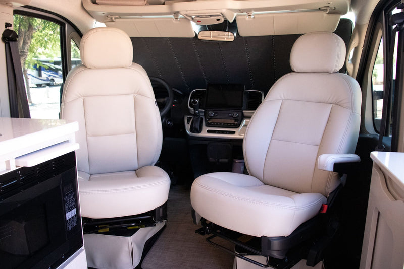  and TV. Perfect for road trip adventures.|Spacious RV rental interior with comfortable benches convertible to beds — photo 10
