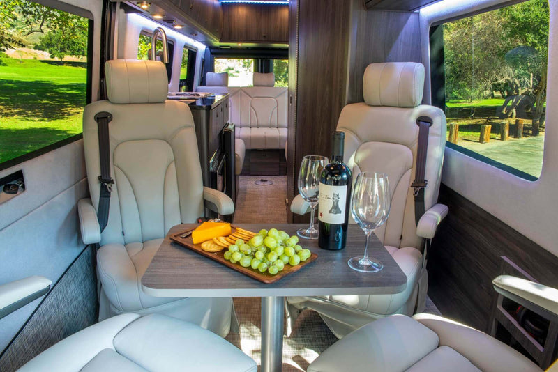 Luxurious RV rental interior with comfortable seating — photo 1