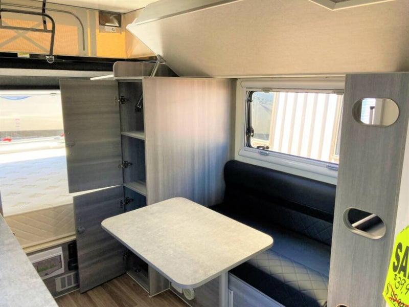  thermostat).|This robust pop-top camper — photo 6