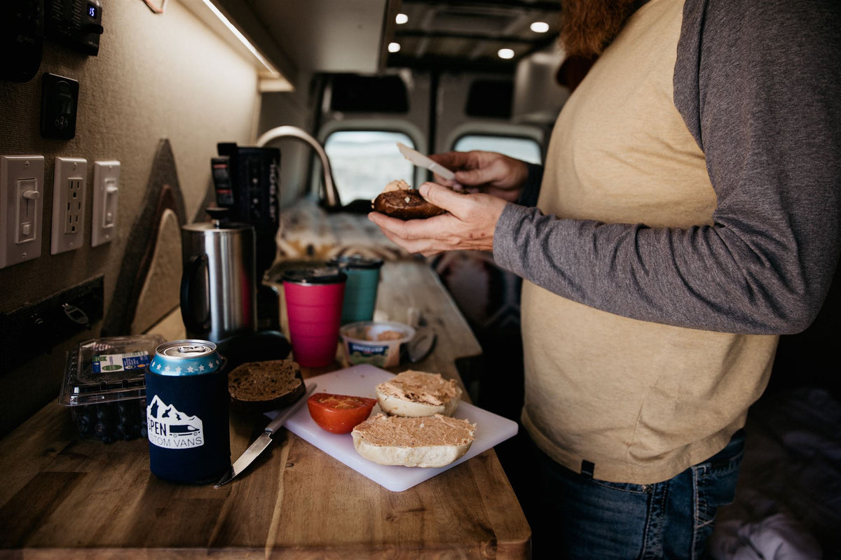  offering cozy van life travel.|Spacious RV rental van interior: wooden ceiling — photo 11