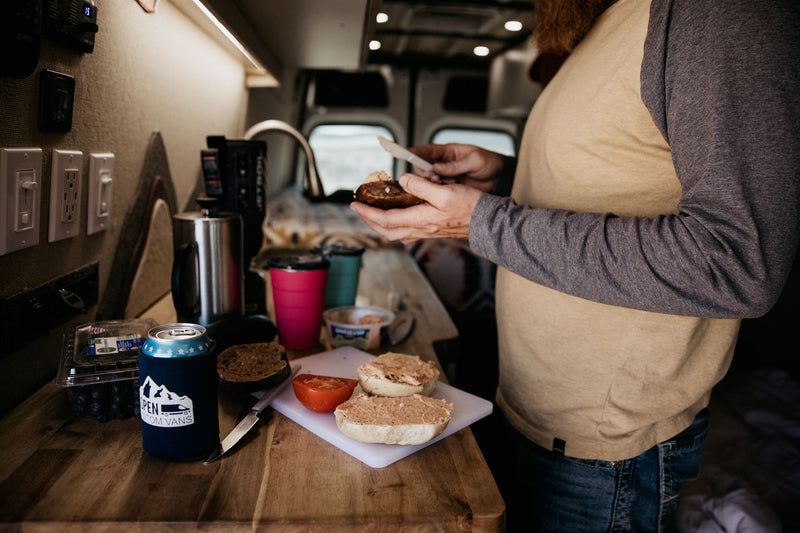  offering cozy van life travel.|Spacious RV rental van interior: wooden ceiling — photo 11