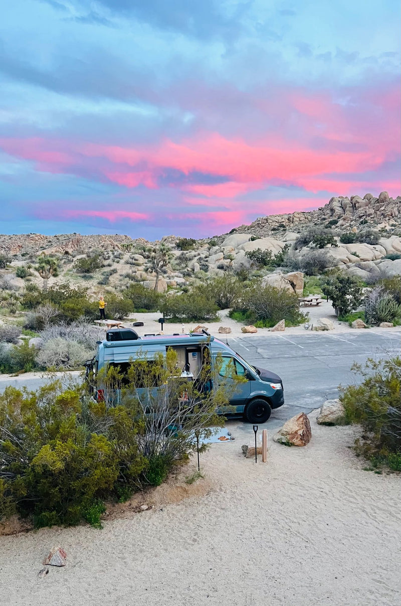  rocks glowing from a campfire.|Scenic desert sunset through a van window — photo 17