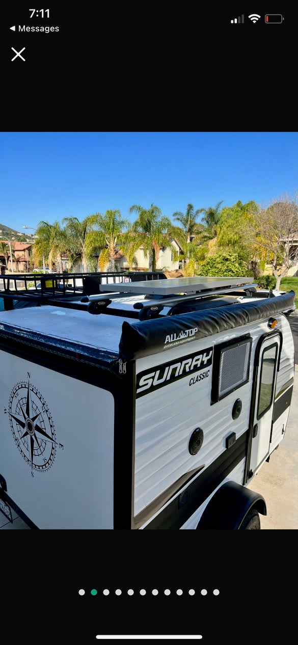 White Sunray Classic travel trailer, ideal for rv rental and outdoor adventure. Awning, roof rack & solar included. — photo 7