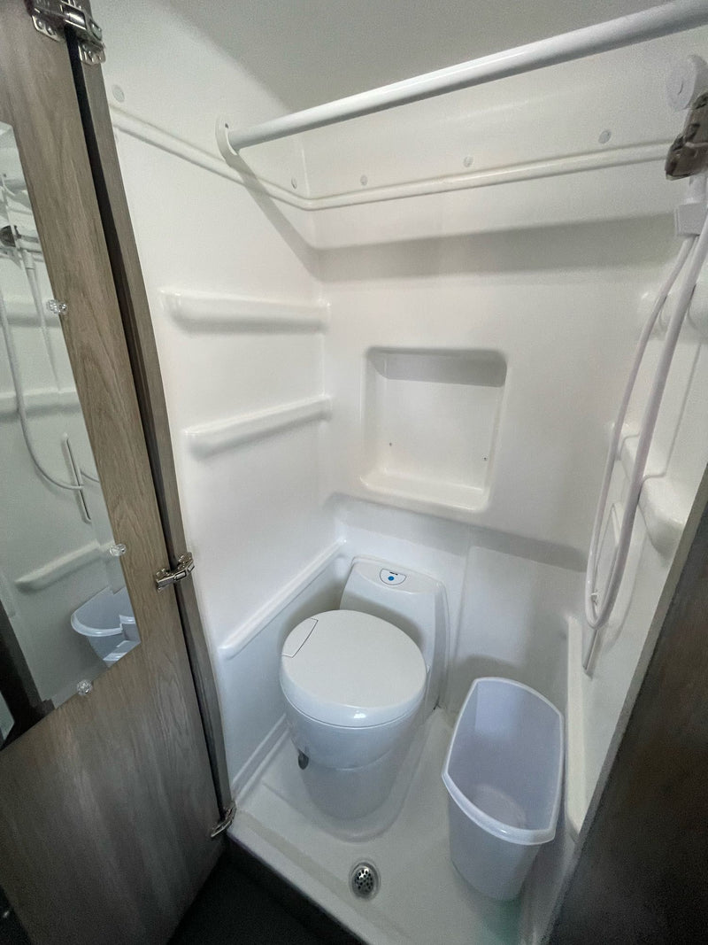  and a ladder to the pop-top bed. Ideal for adventures.|Interior of an RV rental pop-top camper — photo 12