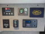 RV rental control panel shows Volta power, water, and climate systems. Key functions for campervan operation and comfort.