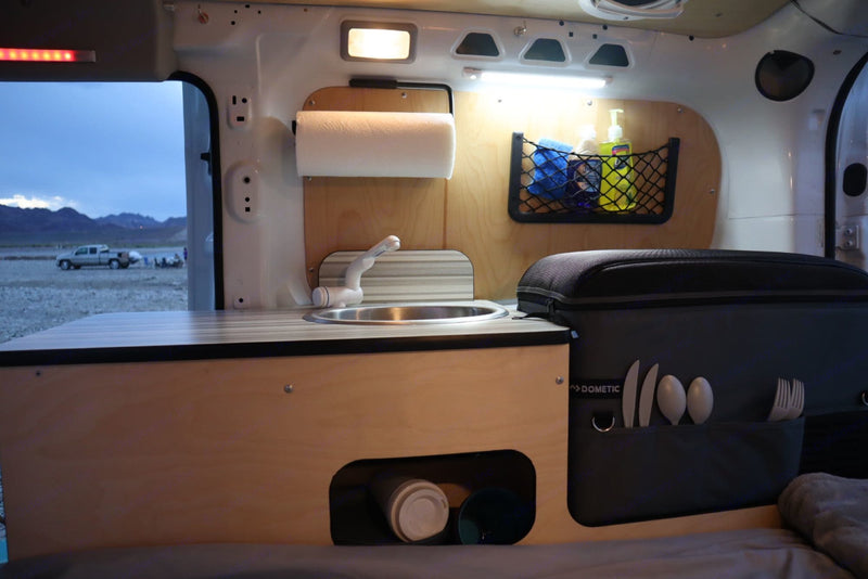  perfect for nature trips.|Inside an RV rental: a cozy bed with camping pillows — photo 8