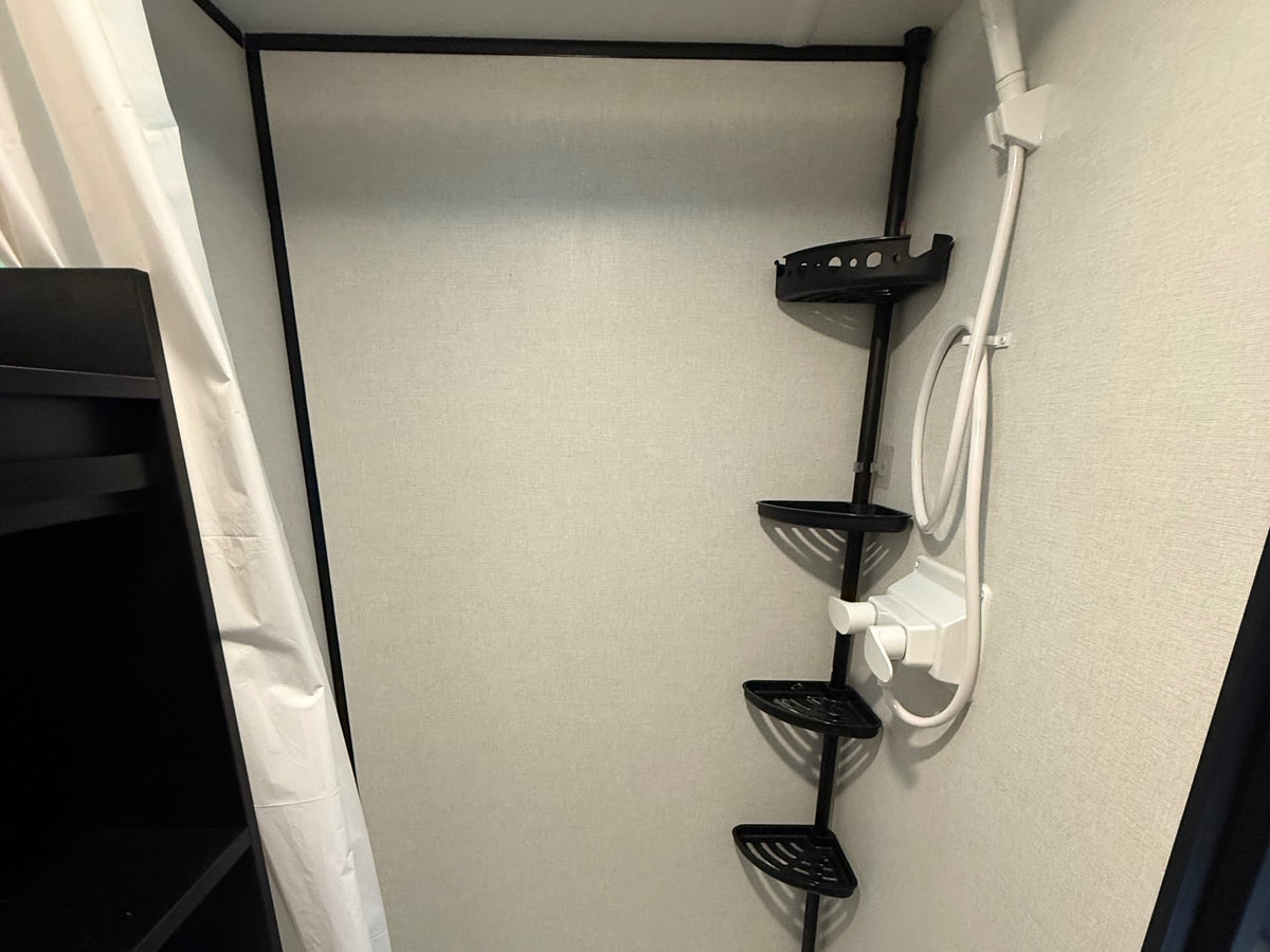  and exterior storage.|RV park sunset view from an RV: white truck — photo 7