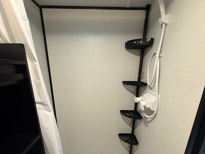  and exterior storage.|RV park sunset view from an RV: white truck — photo 7
