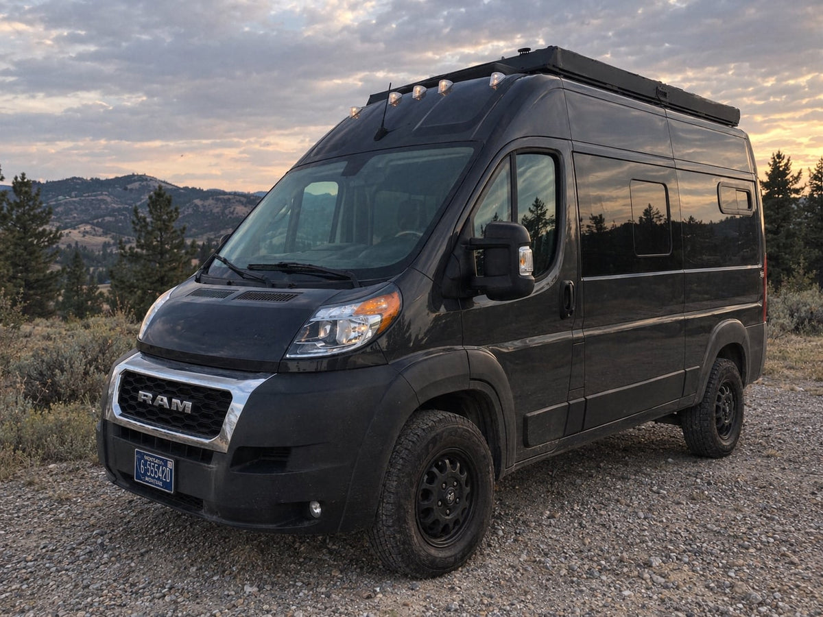  a cozy camper van interior offers a comfy bed — photo 7