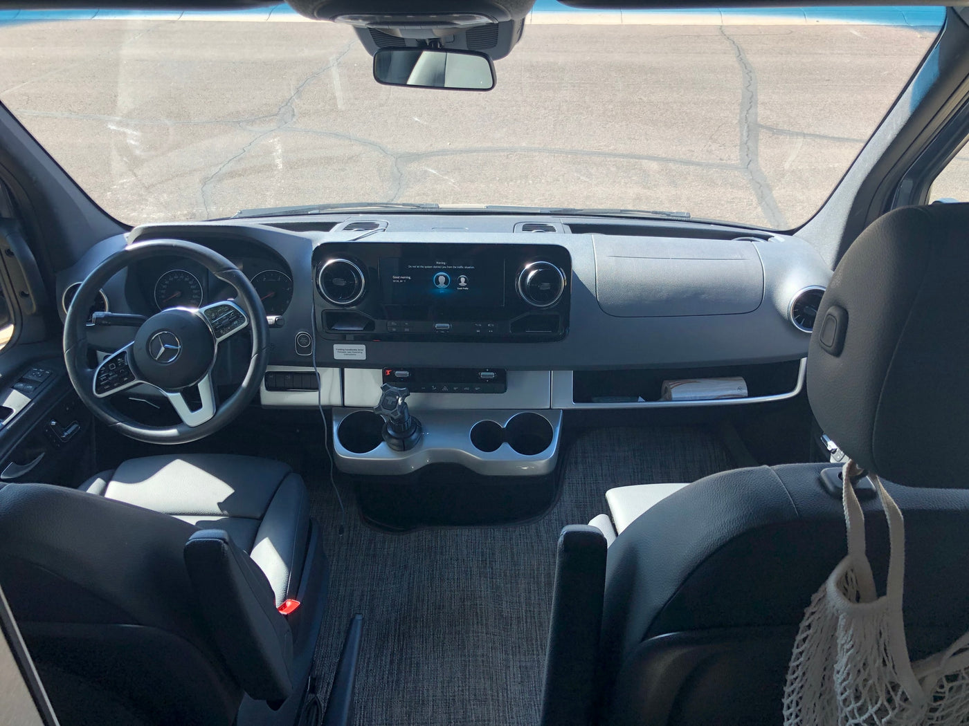  and light/fan controls. Efficient design.|RV rental camper van with open side — photo 20