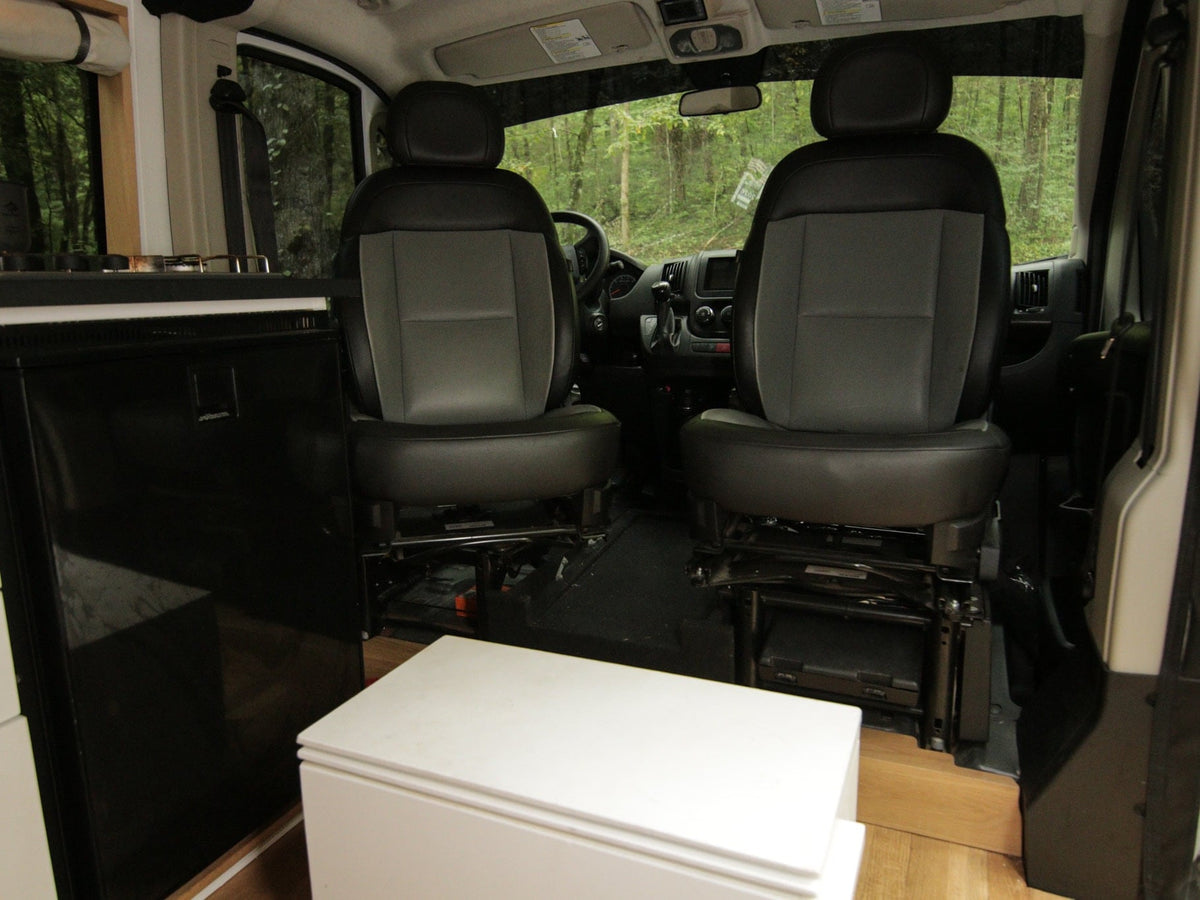  the van's interior shows front seats — photo 13