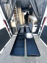  showing a compact camper van's functional kitchenette with sink