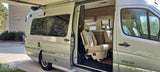 Luxury Era camper van for your next RV rental adventure. See the spacious interior and open side door.