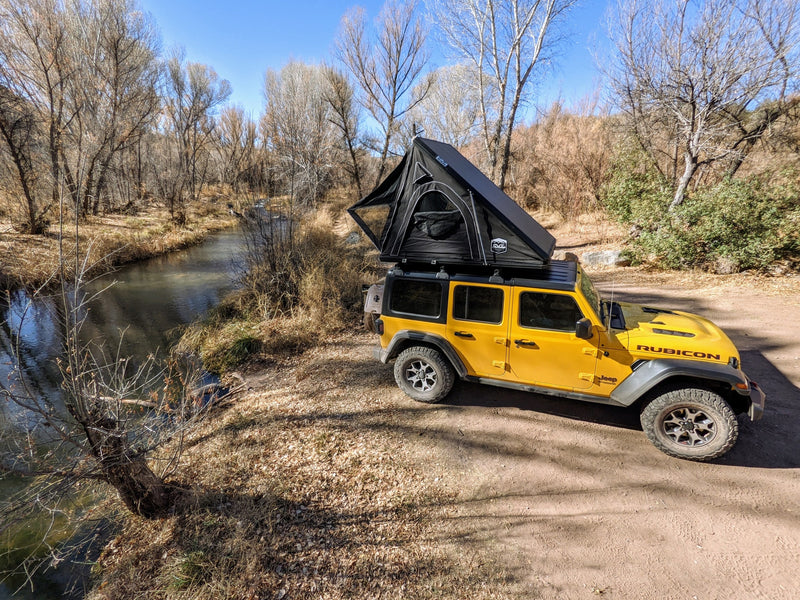  signed for hazardous conditions. Your off-road rv rental adventure starts here!|Overlook with a yellow Jeep featuring a rooftop tent (RV rental) — photo 17
