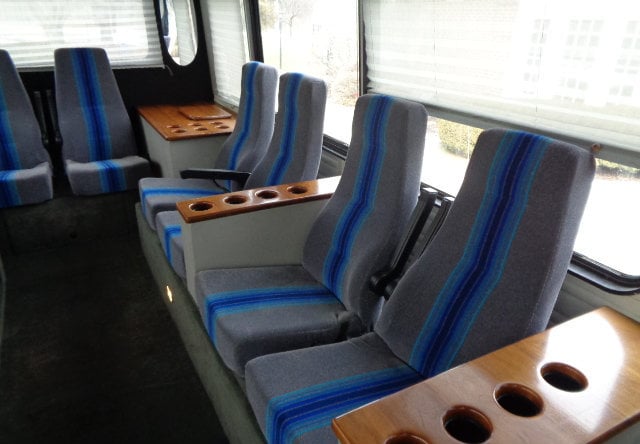  ideal for group travel & special event RV rental.|Step into this custom RV rental — photo 3