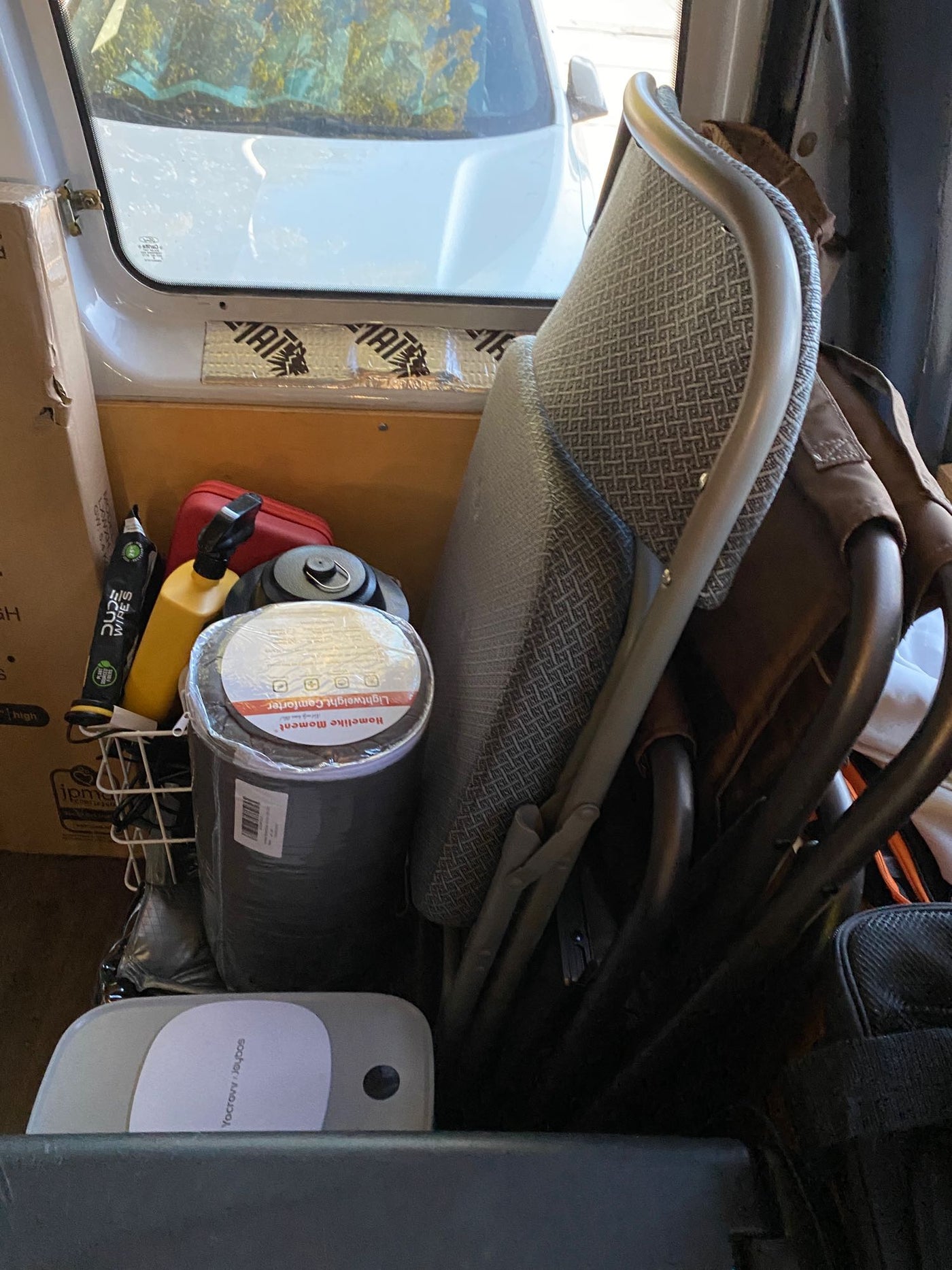  and a charging port.|Experience van life in this rv rental camper van. Features include a wooden ceiling — photo 12