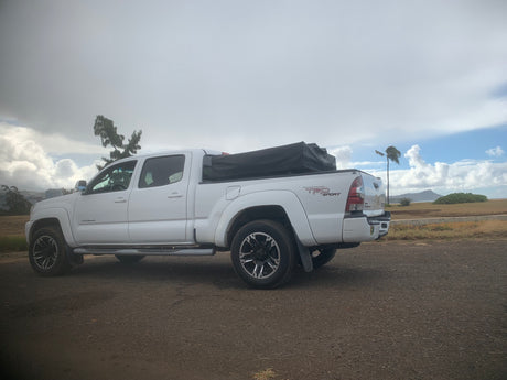  and table by the coast. Experience the outdoors with an rv rental adventure!|White Toyota Tacoma pickup
