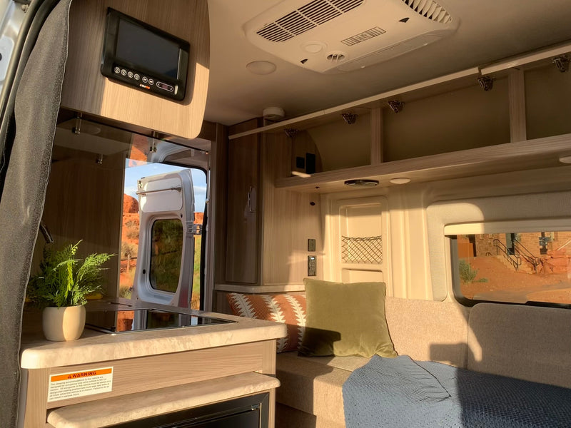  ready for adventure.|Compact RV rental bathroom featuring a toilet — photo 4