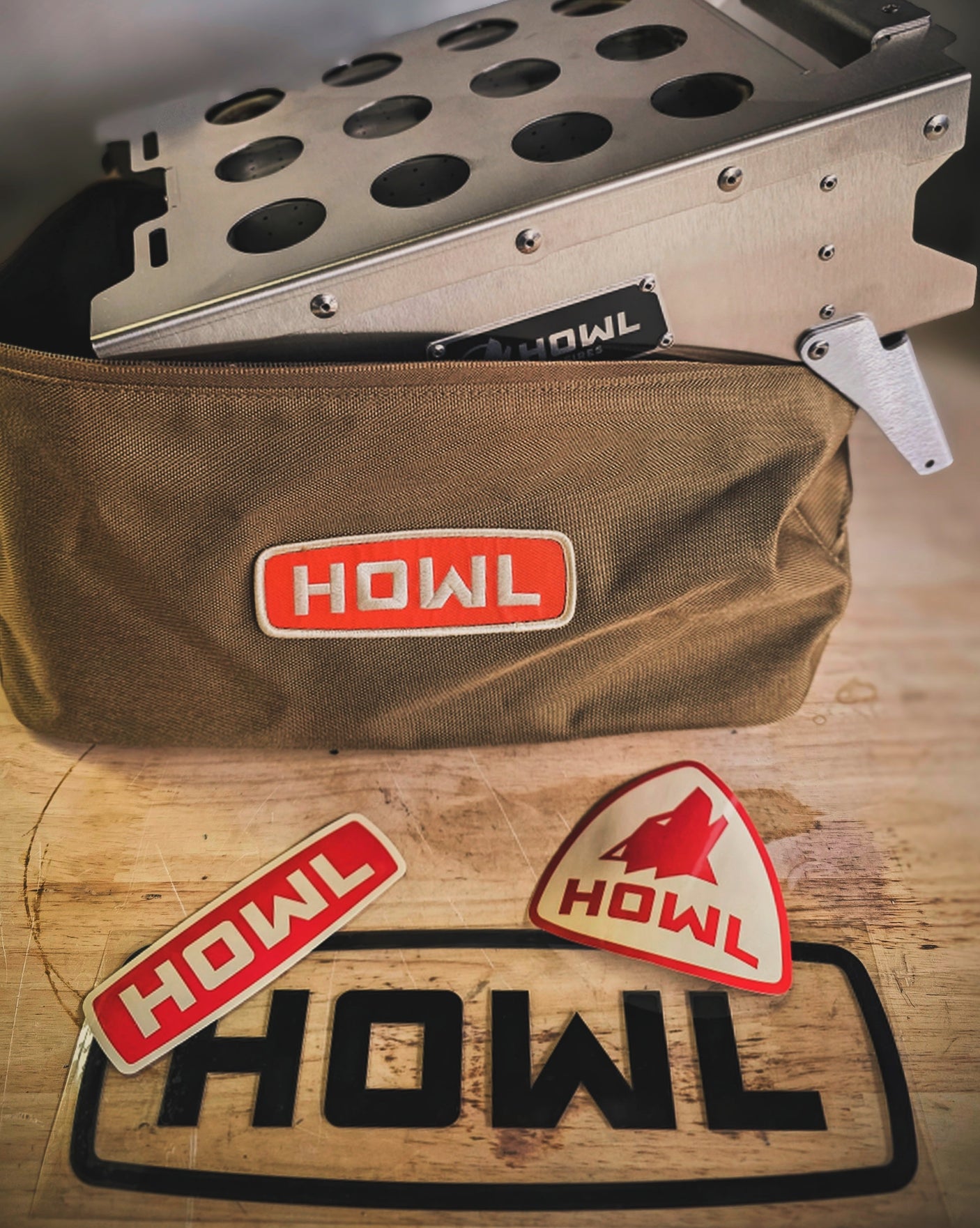 HOWL brand portable cooking gear (grill & storage bag) with stickers, ideal for your RV rental camping trips.