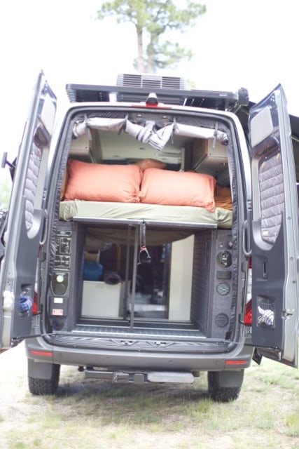  spare tire & storage.|Black BFGoodrich spare tire on a Mercedes-Benz van — photo 11