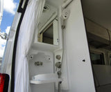 An RV rental's versatile outdoor shower with collapsible sink and mirror offers convenient mobile washing.
