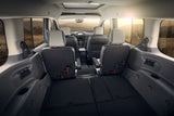 View inside a modern van, showcasing versatile seating & flat cargo area. A comfortable choice for your next RV rental adventure.