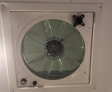 This RV rental features a ceiling vent fan with a protective screen, speed controls (L, M, H, OUT), and a fuse for fresh airflow.