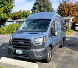A blue Ford Transit van (Work & More rental), perfect for your next rv rental adventure.