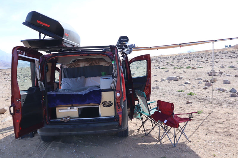  and organized storage for travel.|Cozy RV rental camper van interior — photo 11
