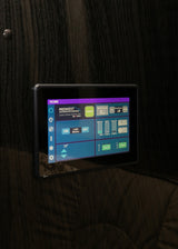 An RV rental's smart digital control panel displays tank levels (fresh 20%), lighting, intercom, and battery voltage.